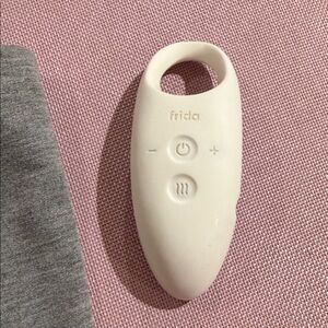 Frida White breast massage device
